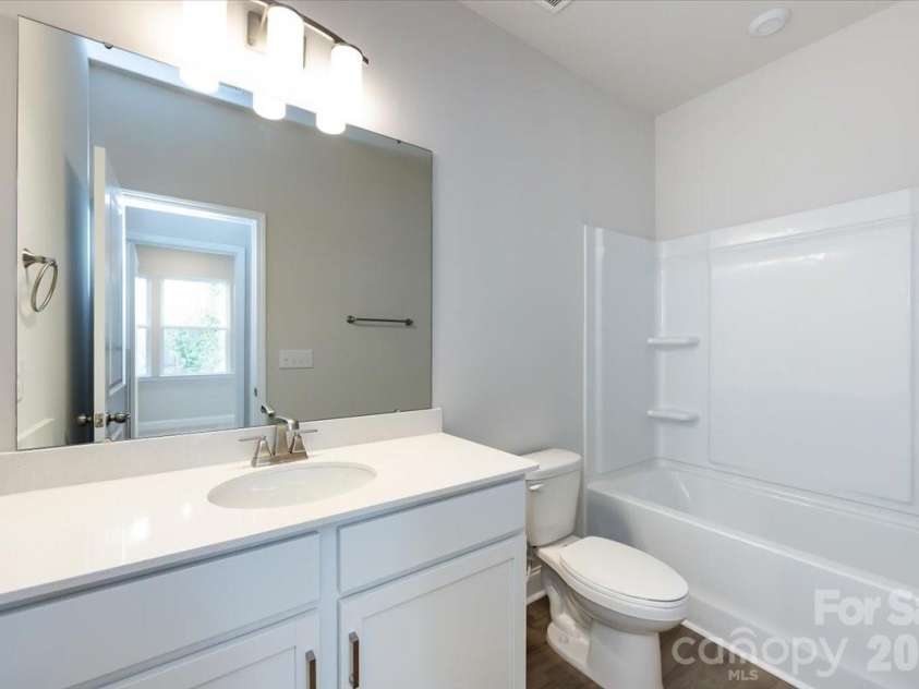 909 Archway Lane, Charlotte, NC 28217.  MLS# CAR4351852, YatesRealty ID 22641. Secondary Bathroom