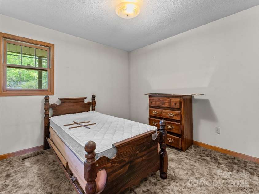 48 Israel Road, Brevard, NC 28712.  MLS# CAR4267767, YatesRealty ID 22642. 