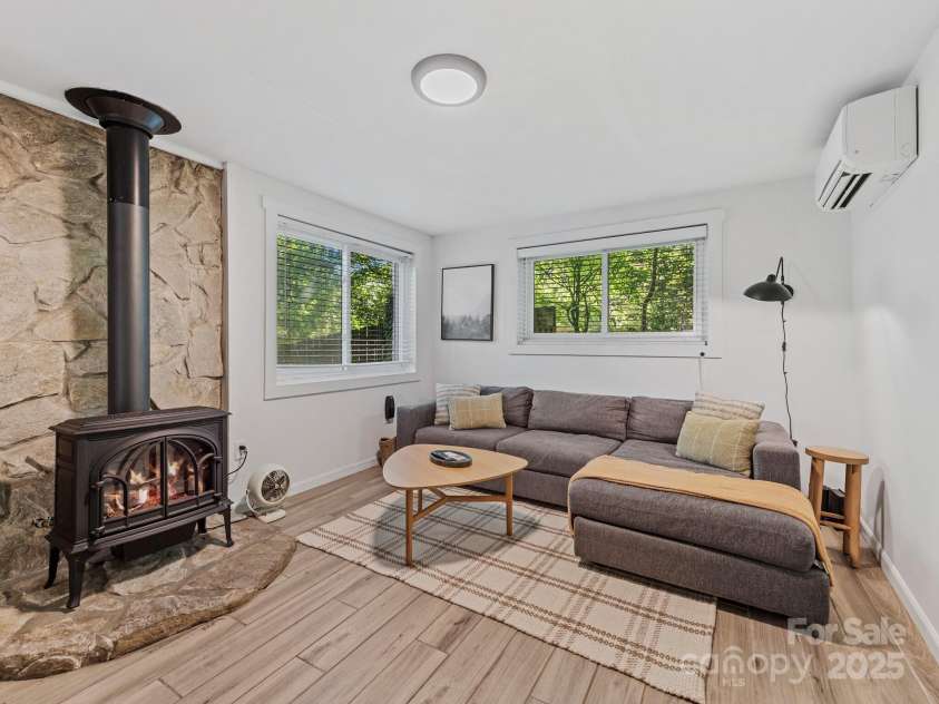 24 Iroquois Street, Black Mountain, NC 28711.  MLS# CAR4251240, YatesRealty ID 22645. Beautiful Stone Hearth