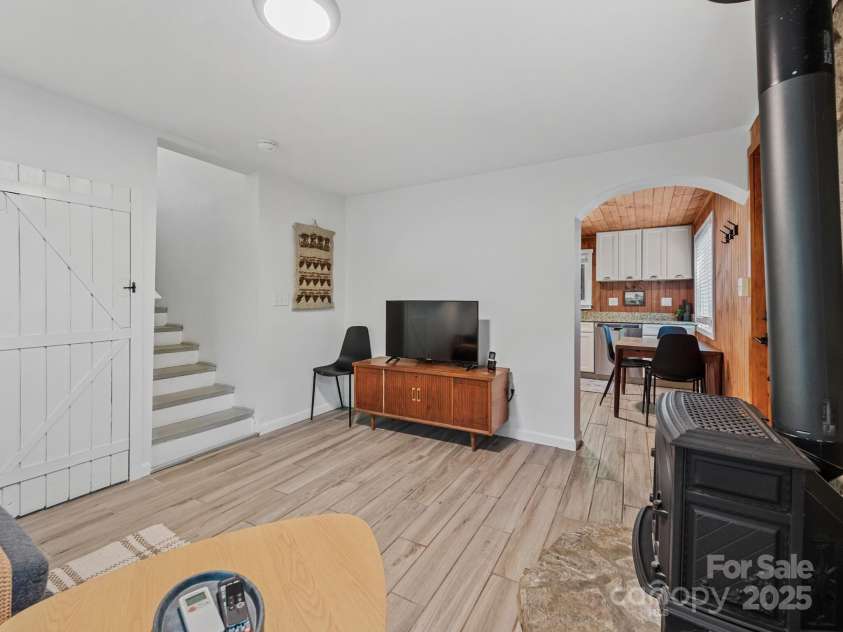 24 Iroquois Street, Black Mountain, NC 28711.  MLS# CAR4251240, YatesRealty ID 22645. Coat Closet, Stairs to Upper Level & Access to Kitchen