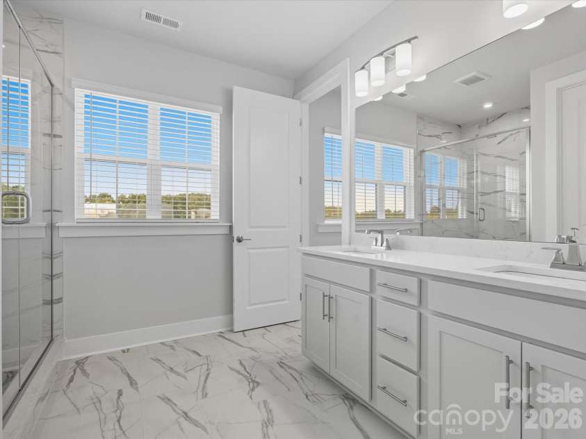 121 Armstrong Road, Belmont, NC 28012.  MLS# CAR4361247, YatesRealty ID 22646. Dual vanity primary 
