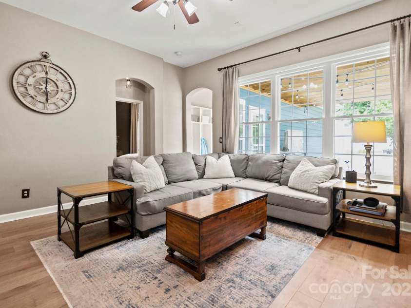 17711 North Shore Circle, Cornelius, NC 28031.  MLS# CAR4273931, YatesRealty ID 22646. Family room with windows to the fenced in backyard