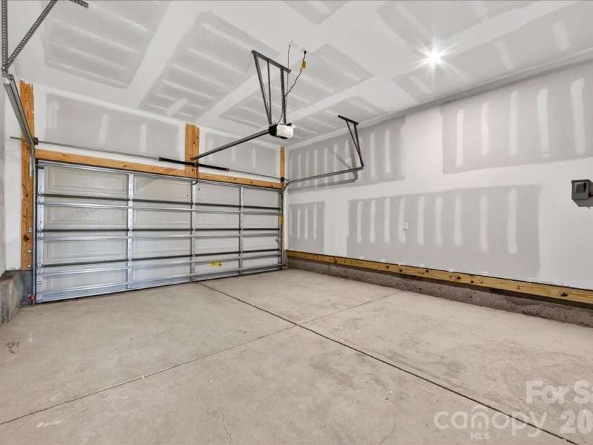 7933 Cedarsmith Court, Charlotte, NC 28217.  MLS# CAR4367732, YatesRealty ID 22647. 2 bay garage