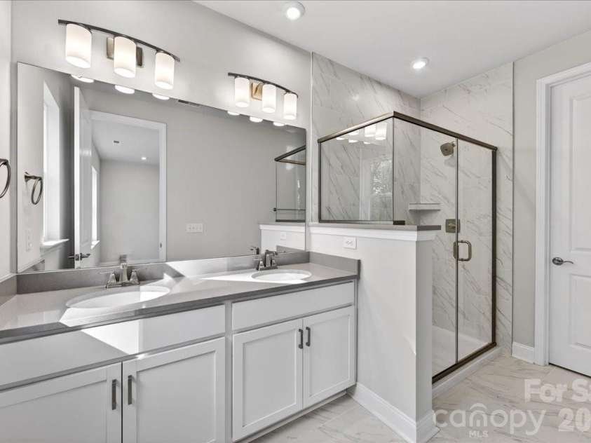 7933 Cedarsmith Court, Charlotte, NC 28217.  MLS# CAR4367732, YatesRealty ID 22647. Dual vanity primary bathroom