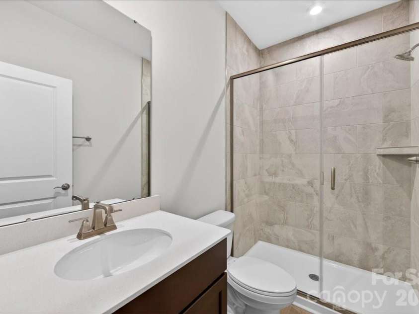 7933 Cedarsmith Court, Charlotte, NC 28217.  MLS# CAR4367732, YatesRealty ID 22647. First floor full bathroom