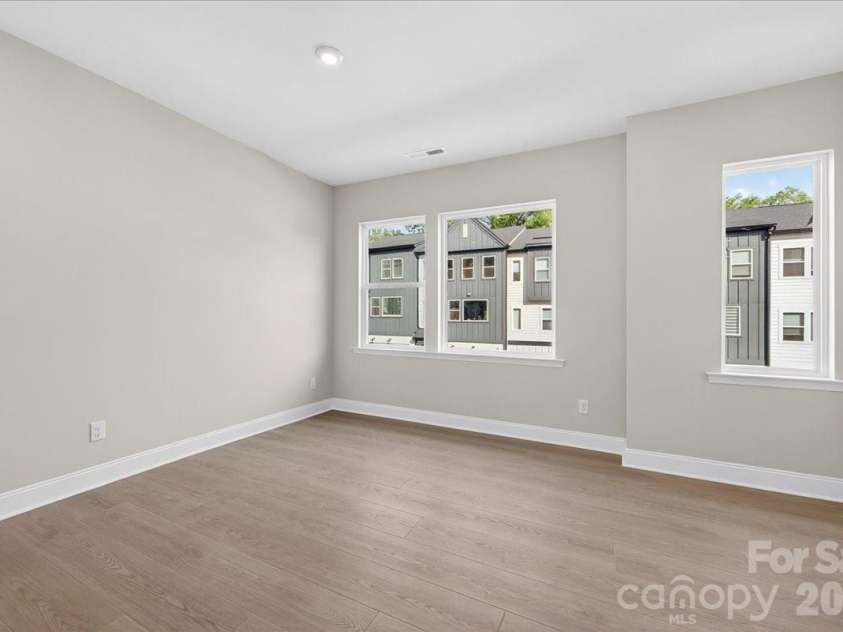 7933 Cedarsmith Court, Charlotte, NC 28217.  MLS# CAR4367732, YatesRealty ID 22647. Light filled living room
