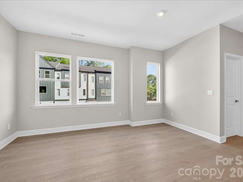7933 Cedarsmith Court, Charlotte, NC 28217.  MLS# CAR4367732, YatesRealty ID 22647. Light filled living room