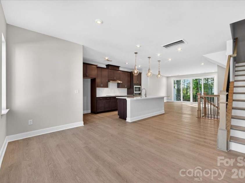 7933 Cedarsmith Court, Charlotte, NC 28217.  MLS# CAR4367732, YatesRealty ID 22647. Light filled living room