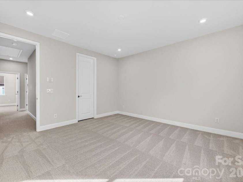 7933 Cedarsmith Court, Charlotte, NC 28217.  MLS# CAR4367732, YatesRealty ID 22647. Light filled primary bedroom
