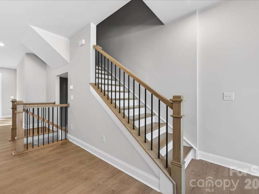 7933 Cedarsmith Court, Charlotte, NC 28217.  MLS# CAR4367732, YatesRealty ID 22647. Oak Box stairs and open rails