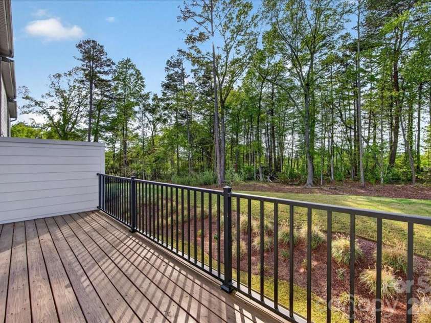 7933 Cedarsmith Court, Charlotte, NC 28217.  MLS# CAR4367732, YatesRealty ID 22647. Second floor outdoor living with tree views