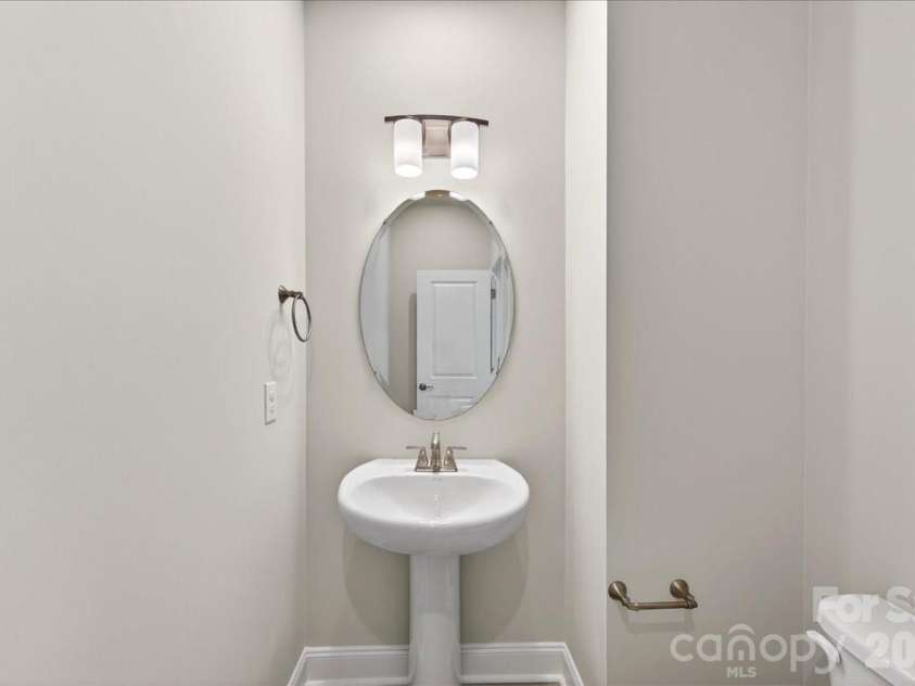 7933 Cedarsmith Court, Charlotte, NC 28217.  MLS# CAR4367732, YatesRealty ID 22647. Second floor powder room