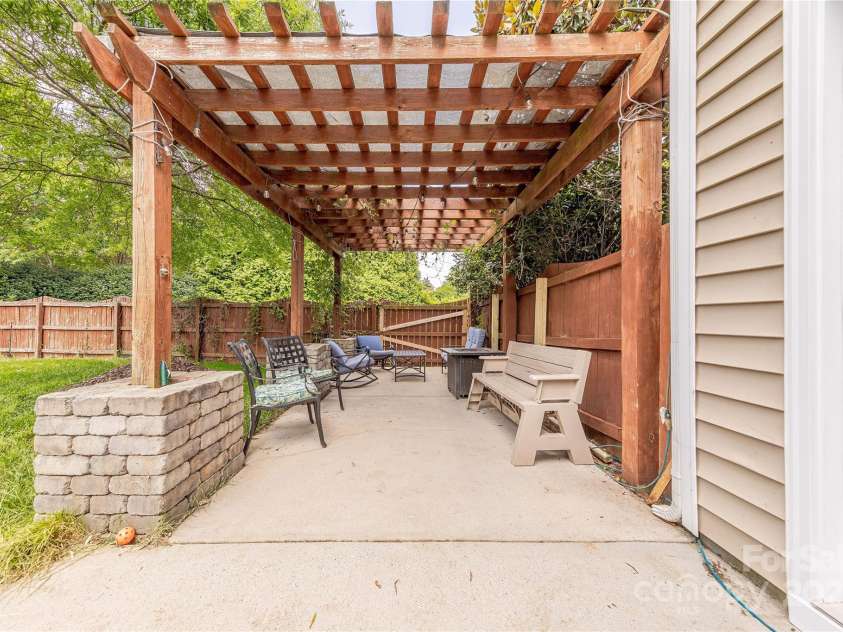 516 Fair Oaks Drive, Fort Mill, SC 29708.  MLS# CAR4267064, YatesRealty ID 22648. Expanded Patio With Pergola