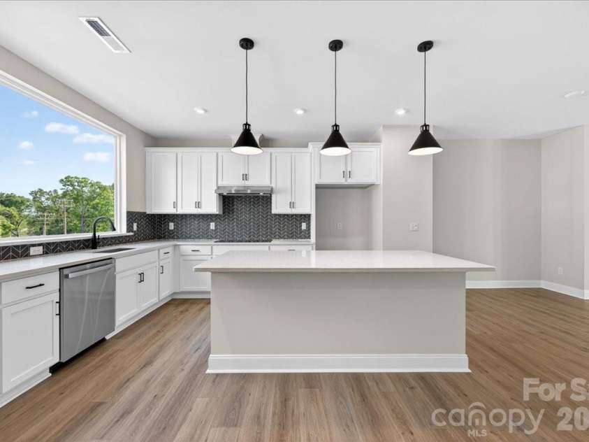 7929 Cedarsmith Court, Charlotte, NC 28217.  MLS# CAR4367747, YatesRealty ID 22648. Gourmet Kitchen with Large window for ample natural light