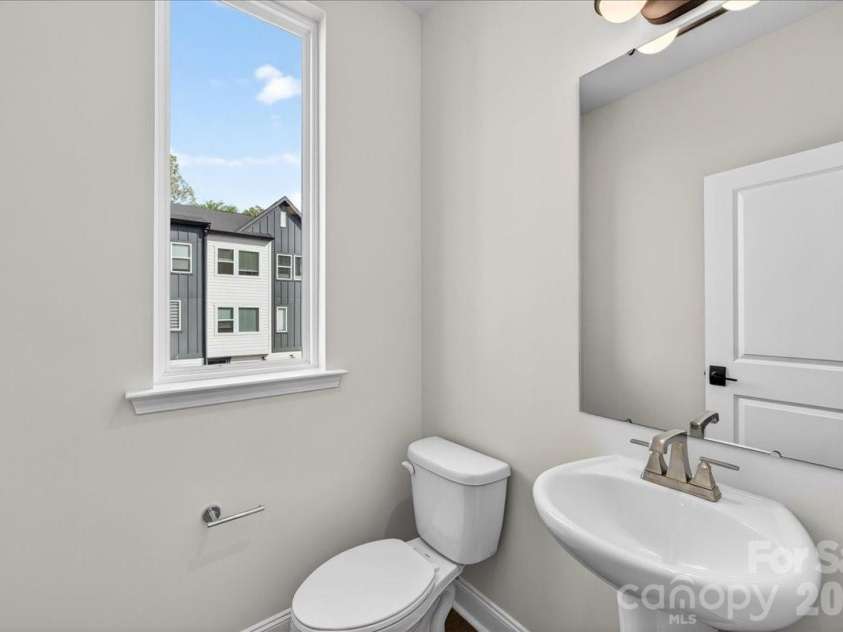 7929 Cedarsmith Court, Charlotte, NC 28217.  MLS# CAR4367747, YatesRealty ID 22648. Second floor powder room