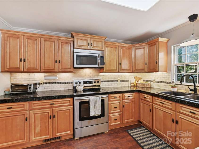 3232 Kale Lane, Matthews, NC 28105.  MLS# CAR4245282, YatesRealty ID 22649. 