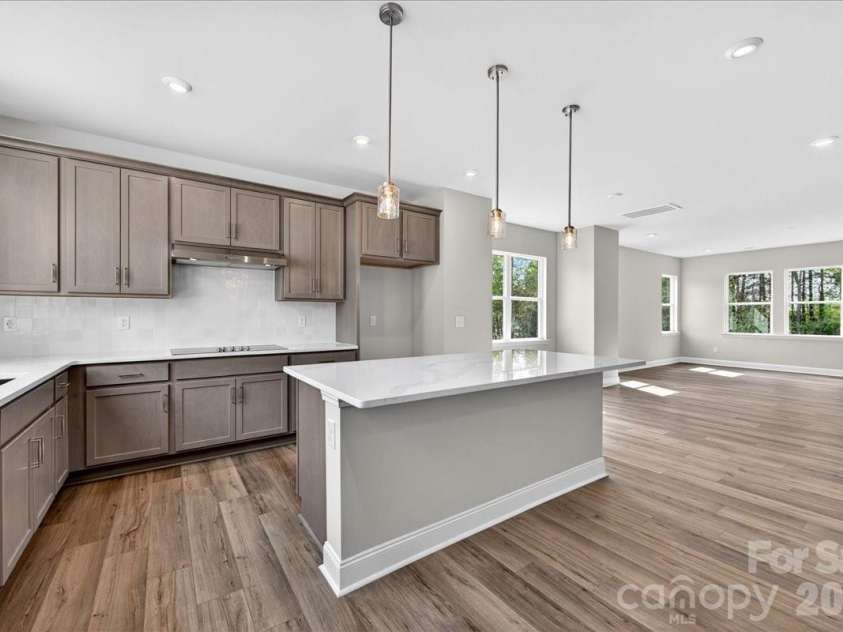 7921 Cedarsmith Court, Charlotte, NC 28217.  MLS# CAR4367826, YatesRealty ID 22649. Gourmet kitchen with open concept second floor
