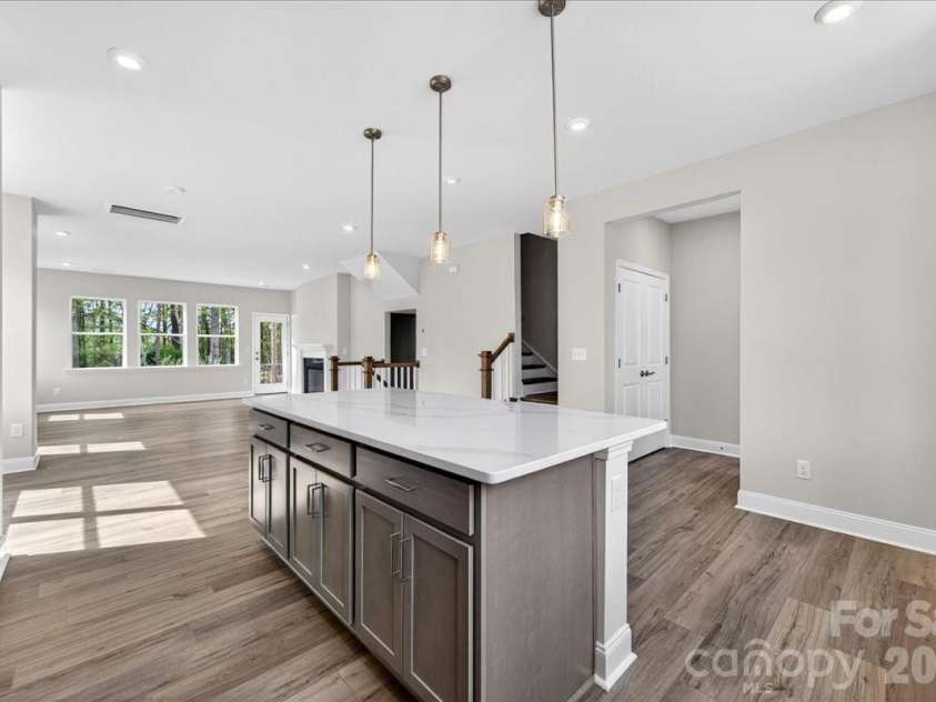 7921 Cedarsmith Court, Charlotte, NC 28217.  MLS# CAR4367826, YatesRealty ID 22649. Large kitchen island providing ample storage
