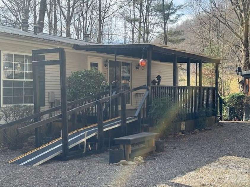 1372 Lickskillet Road, Burnsville, NC 28714.  MLS# CAR4333089, YatesRealty ID 2265. Covered Back Porch