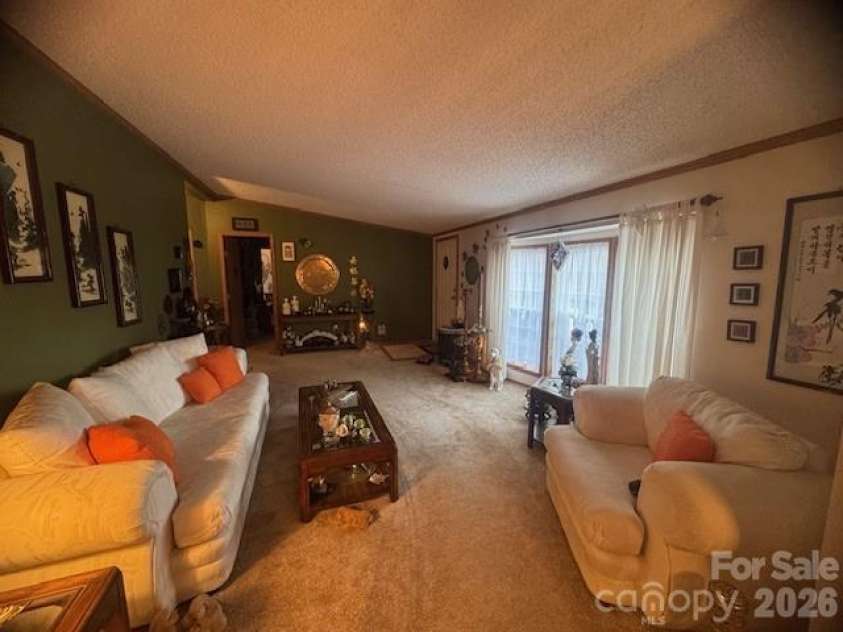 1372 Lickskillet Road, Burnsville, NC 28714.  MLS# CAR4333089, YatesRealty ID 2265. Formal Living Room
