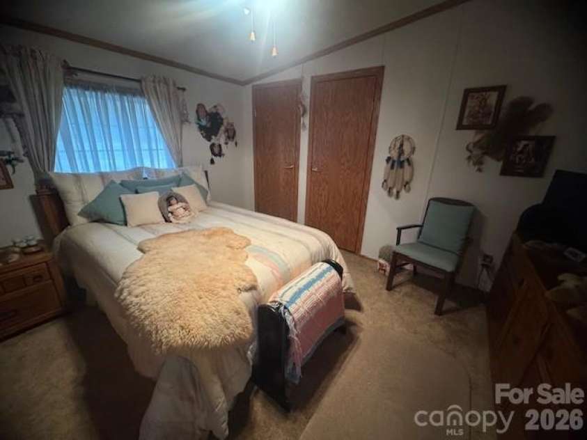 1372 Lickskillet Road, Burnsville, NC 28714.  MLS# CAR4333089, YatesRealty ID 2265. Guest Bedroom