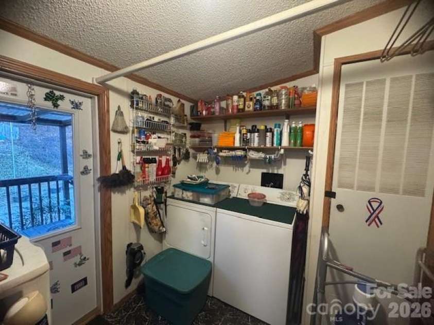 1372 Lickskillet Road, Burnsville, NC 28714.  MLS# CAR4333089, YatesRealty ID 2265. Lanudry Room