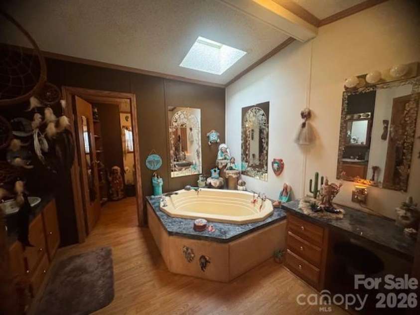 1372 Lickskillet Road, Burnsville, NC 28714.  MLS# CAR4333089, YatesRealty ID 2265. Primary Bath