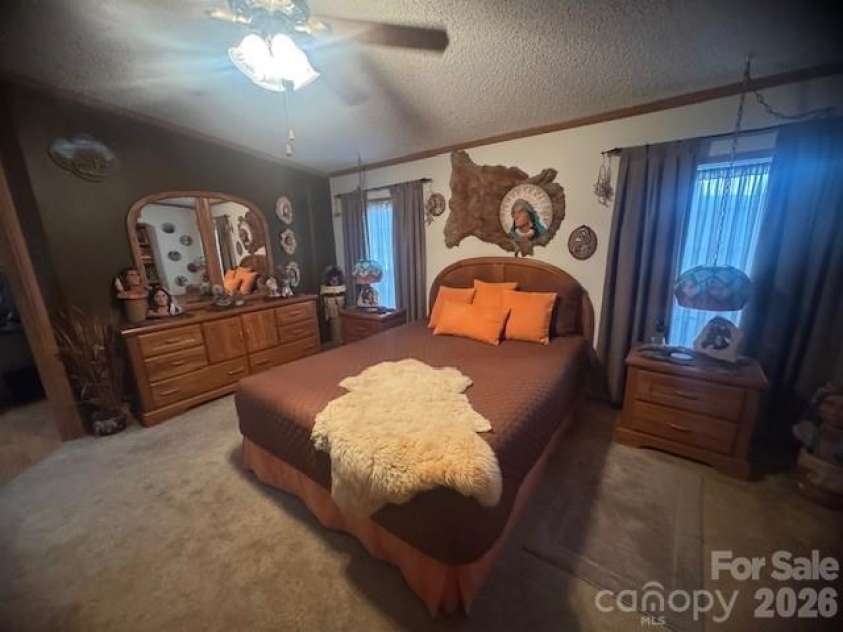 1372 Lickskillet Road, Burnsville, NC 28714.  MLS# CAR4333089, YatesRealty ID 2265. Primary Bedroom