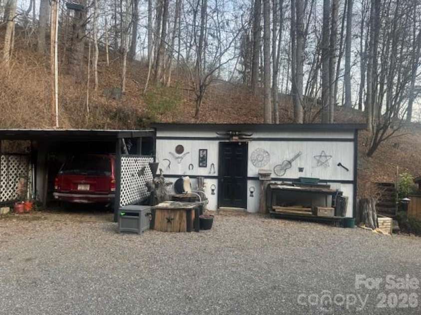 1372 Lickskillet Road, Burnsville, NC 28714.  MLS# CAR4333089, YatesRealty ID 2265. Utility Shed and covered parking.