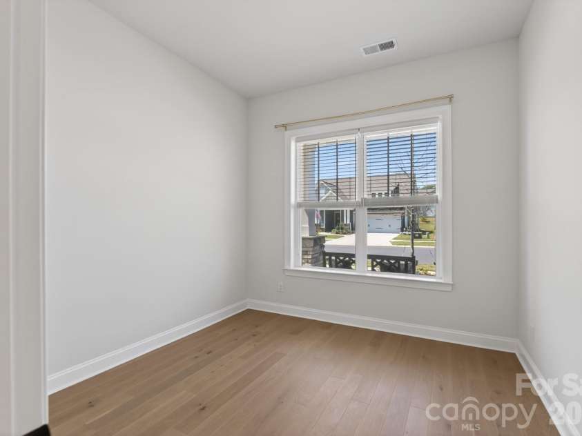 1405 Encore Lane, Waxhaw, NC 28173.  MLS# CAR4366207, YatesRealty ID 22650. Front Secondary Bedroom