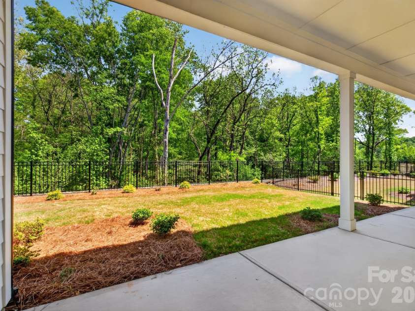 1405 Encore Lane, Waxhaw, NC 28173.  MLS# CAR4366207, YatesRealty ID 22650. Rear View from Covered Porch