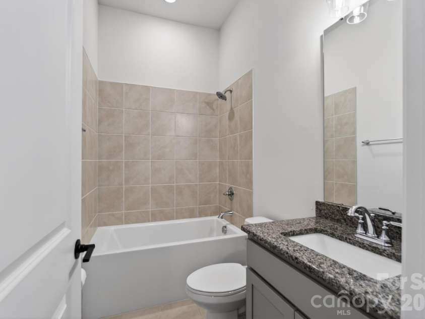 1405 Encore Lane, Waxhaw, NC 28173.  MLS# CAR4366207, YatesRealty ID 22650. Secondary Bathroom in Secondary Bedroom