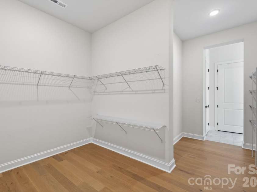 1405 Encore Lane, Waxhaw, NC 28173.  MLS# CAR4366207, YatesRealty ID 22650. Spacious Primary Bedroom Closet