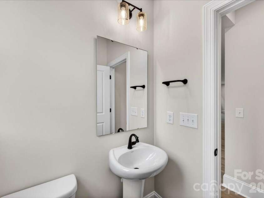 420 Old Town Village Road, Waxhaw, NC 28173.  MLS# CAR4375693, YatesRealty ID 22653. Second floor powder