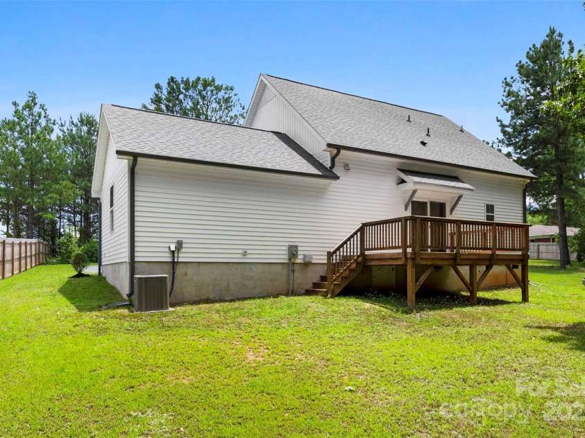 529 Central Avenue, Locust, NC 28097.  MLS# CAR4274462, YatesRealty ID 22653. Exterior, completely fenced wtih gated access