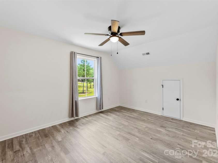 529 Central Avenue, Locust, NC 28097.  MLS# CAR4274462, YatesRealty ID 22653. Guest room two (upstairs)