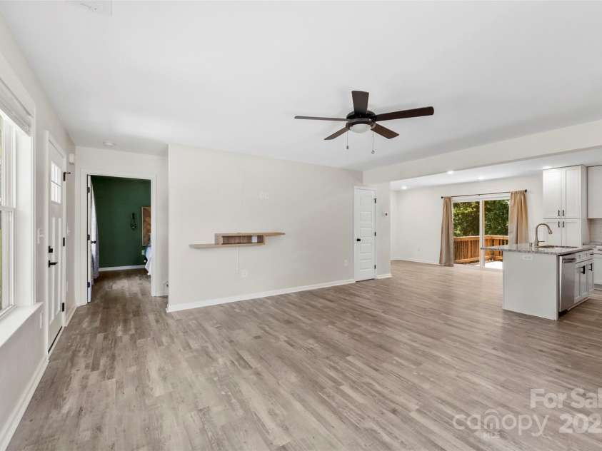 529 Central Avenue, Locust, NC 28097.  MLS# CAR4274462, YatesRealty ID 22653. Open living space spanning from the front to the rear of the home