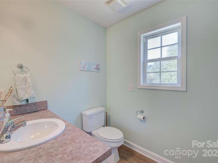 207 Sherrill Street, Oak Island, NC 28465.  MLS# CAR4216599, YatesRealty ID 2266. 