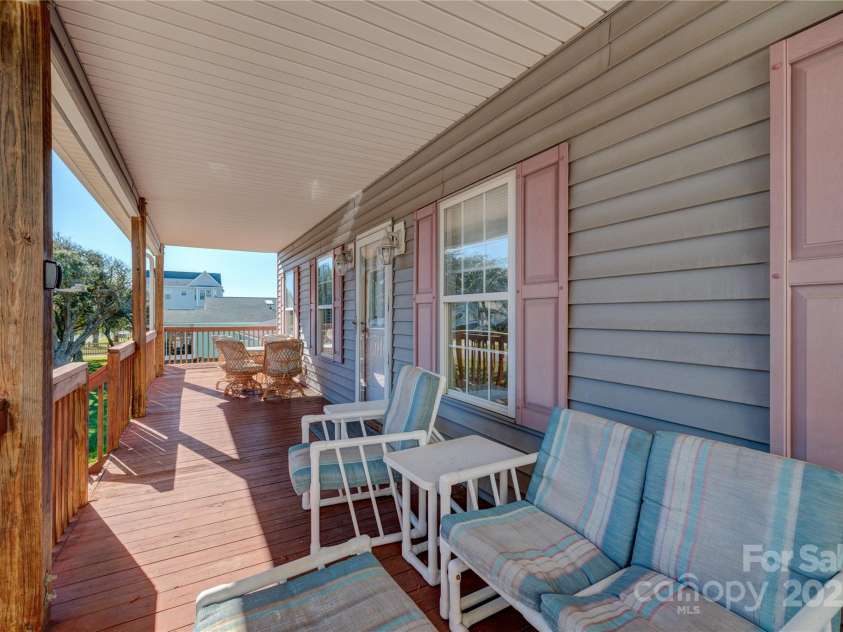 207 Sherrill Street, Oak Island, NC 28465.  MLS# CAR4216599, YatesRealty ID 2266. 