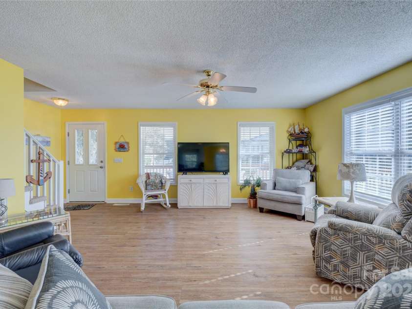 207 Sherrill Street, Oak Island, NC 28465.  MLS# CAR4216599, YatesRealty ID 2266. 