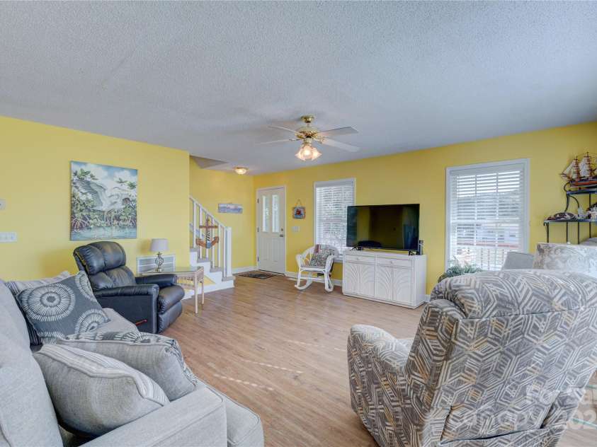 207 Sherrill Street, Oak Island, NC 28465.  MLS# CAR4216599, YatesRealty ID 2266. 