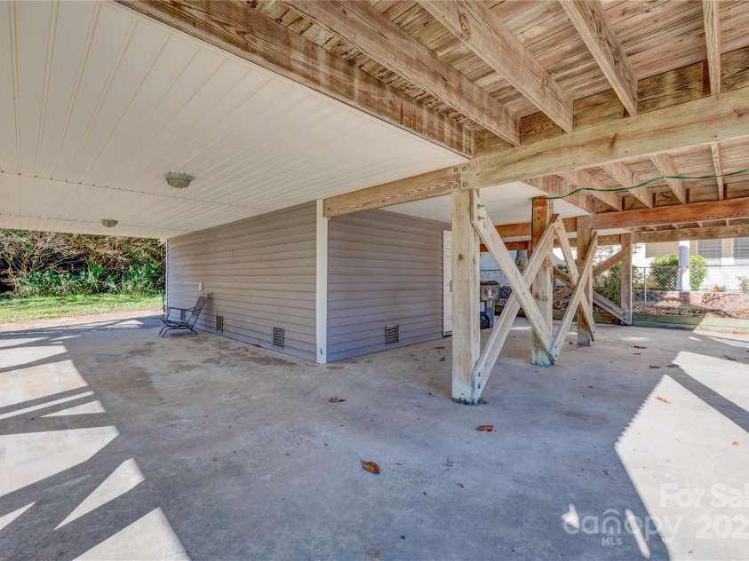 207 Sherrill Street, Oak Island, NC 28465.  MLS# CAR4216599, YatesRealty ID 2266. 