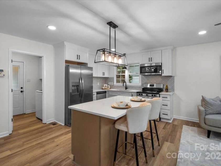 4932 Delivau Drive, Charlotte, NC 28215.  MLS# CAR4275777, YatesRealty ID 22660. Fully updated kitchen w/ island