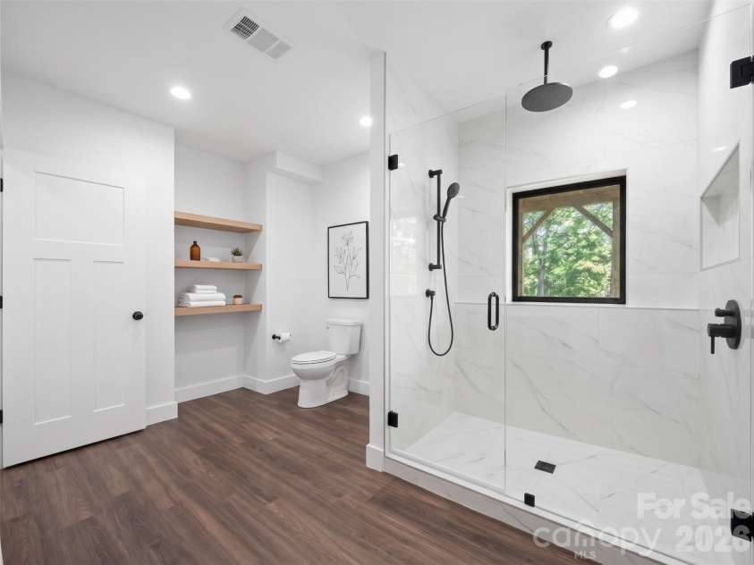 114 Phivo Drive, Balsam Grove, NC 28708.  MLS# CAR4423780, YatesRealty ID 22663. AI generated Virtual staged bathroom