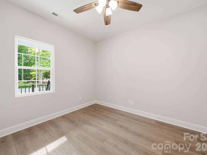 6721 Jesse Rushing Road, Marshville, NC 28103.  MLS# CAR4371429, YatesRealty ID 22668. Front Bedroom