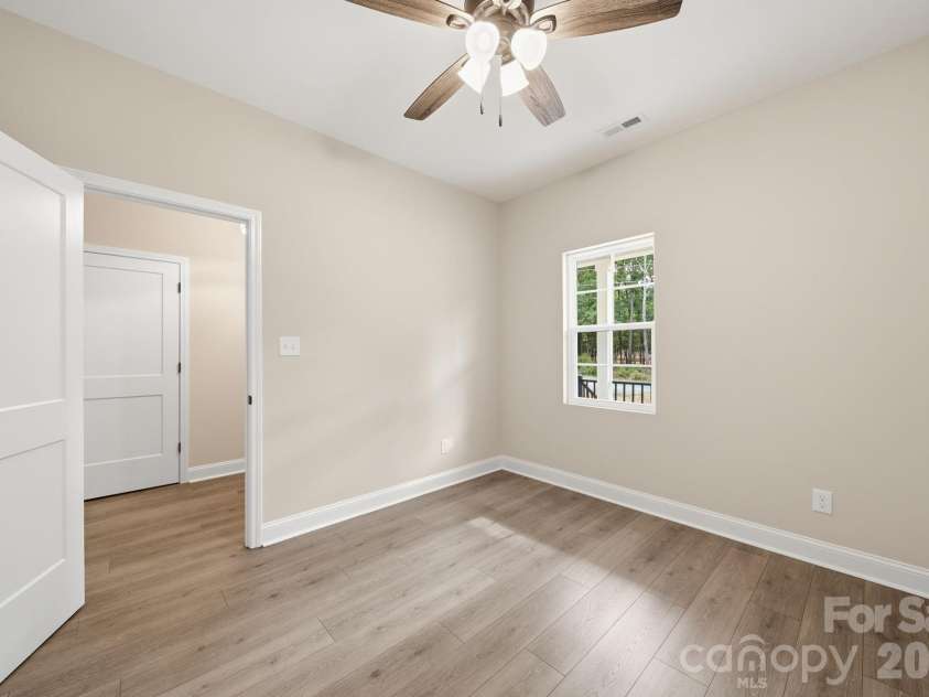 6721 Jesse Rushing Road, Marshville, NC 28103.  MLS# CAR4371429, YatesRealty ID 22668. Front Bedroom
