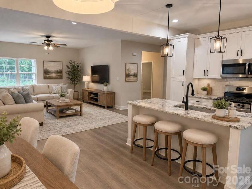 6721 Jesse Rushing Road, Marshville, NC 28103.  MLS# CAR4371429, YatesRealty ID 22668. Staged living/kitchen