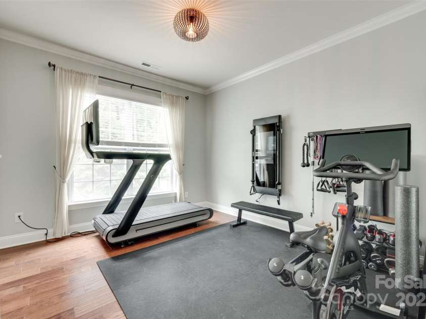 645 Brookhaven Drive, Fort Mill, SC 29708.  MLS# CAR4264322, YatesRealty ID 22675. Bedroom one being used as a gym