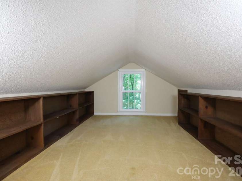 14040 Hackamore Drive, Matthews, NC 28105.  MLS# CAR4366899, YatesRealty ID 22676. Storage Room with built in shelves