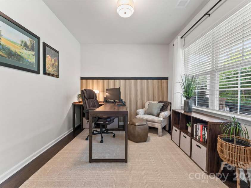 17231 Rider Wood Lane, Charlotte, NC 28278.  MLS# CAR4269861, YatesRealty ID 22676. A private office with French Doors at the front of the house, away from the main living space.